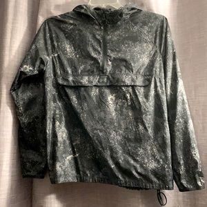 Under Armour hooded lightweight windbreaker jacket. Size Small. Black and grey.